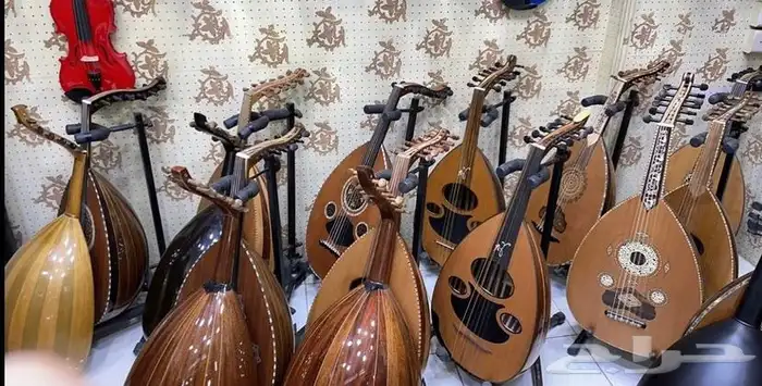 الالات موسيقيه غيتار وعود  بيانو وكمان  5