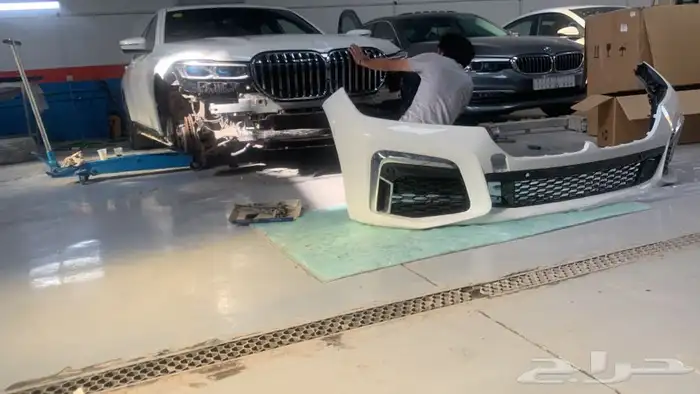 قطع غيار bmw وصيانة وسمكرة وبوية مركز سيارة نجوم 62