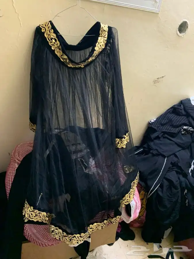 تنانير وبلايز قمصان نسائية مستعملة 44