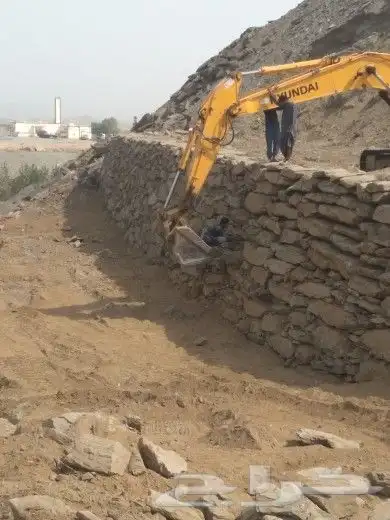 بكلين لقص الاراضي وبناالحجر والردميات والهدم 2