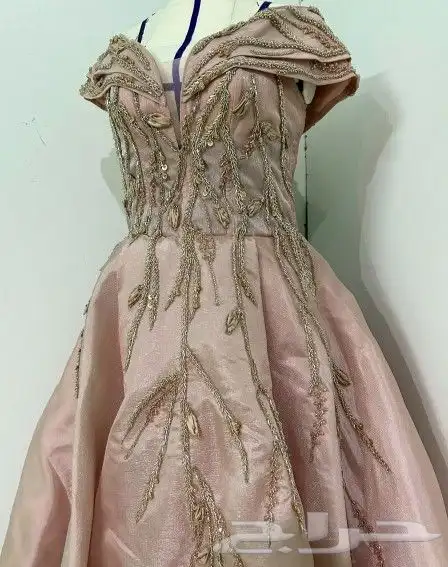 فستان زواج وملكه ومسكه وحذاء 3