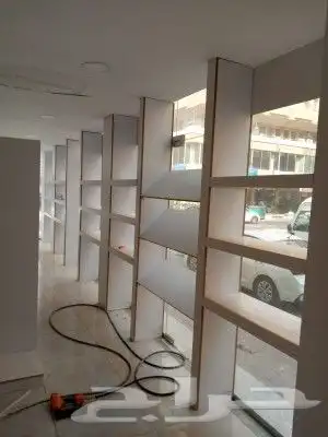 نجار .تجهيز محلات التجاريه ..وجميع اعمل الديكورات 23
