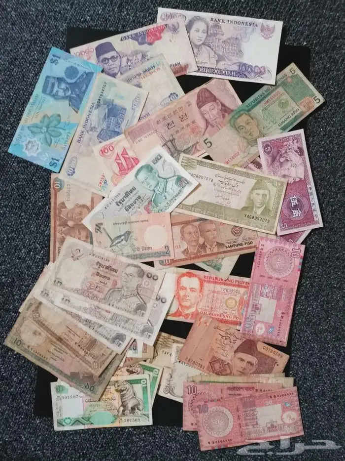 عملات ورقية ومعدنية قديمة مشكلة ومتنوعة من شتى دول العالم 1