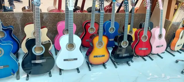 قيتار جيتار قيثارة اعواد كمنجات كمنجه آلات مو 16