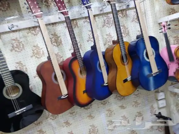 قيتار جيتار قيثارة اعواد كمنجات كمنجه آلات مو 12