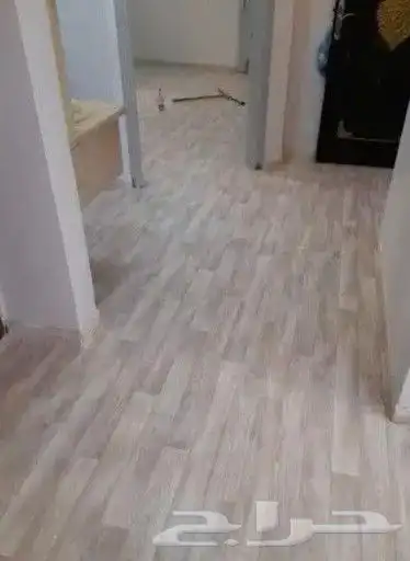 مشمع بلاستيك قابل للغسيل علي شكل باركية 24