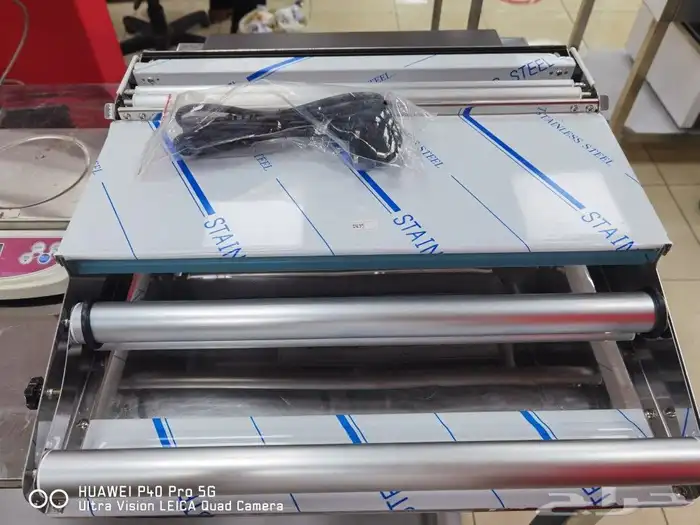 جهاز تغليف الاطباق 0