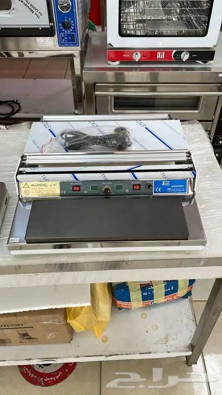 جهاز تغليف الاطباق 1