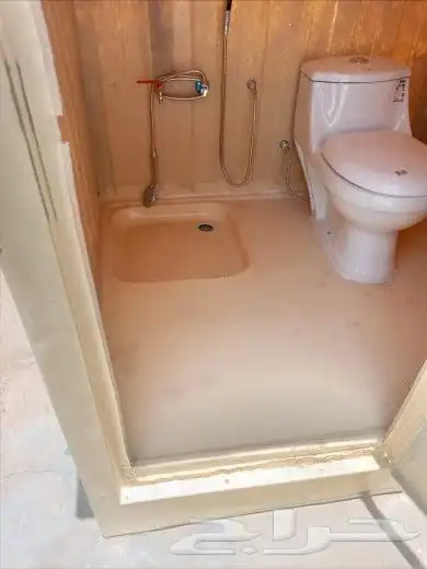 تجهيز مخيمات دورات مياه خيام غرف خشب 0