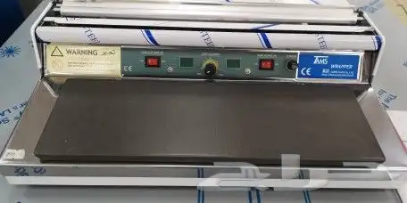 جهاز تغليف الاطباق 5