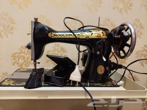 مكينه خياطه سنجر للبيع 0