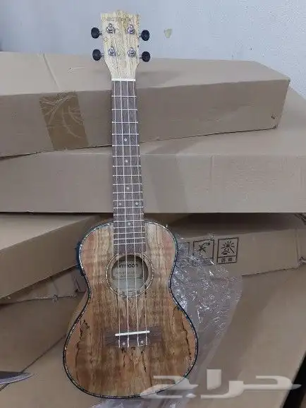 يوكليلي آلات موسيقية أعواد جيتار طبل دفوف 0