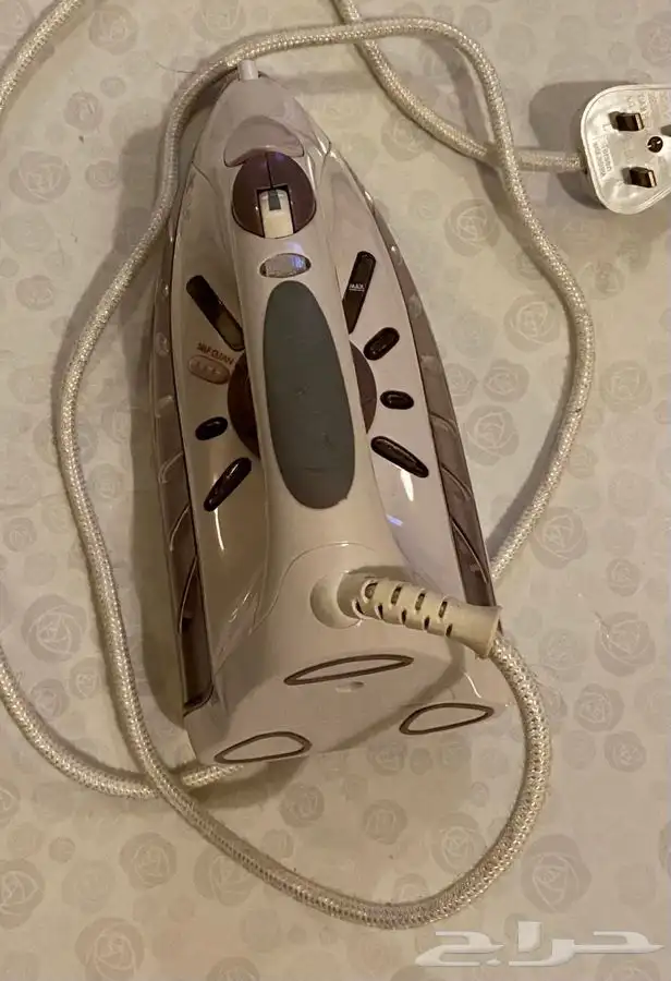 كاوية بخار يدوية .Steam Iron 4