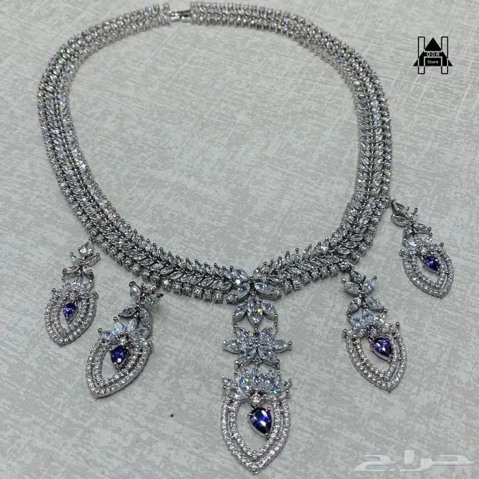 طقم فضه ( Silver ) عيار 925 مرصع بياقوت أزرق (زفير) وزركون 2