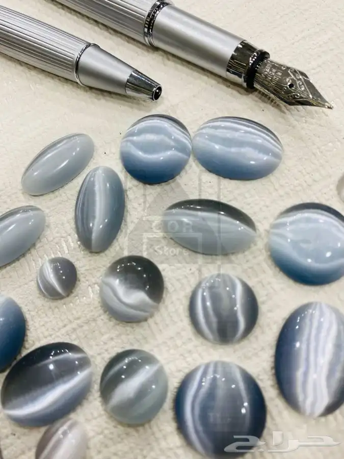 سبحة او مسبحه حجر عين القط بشراب وشواهد فضية 5