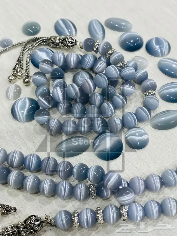 سبحة او مسبحه حجر عين القط بشراب وشواهد فضية 7