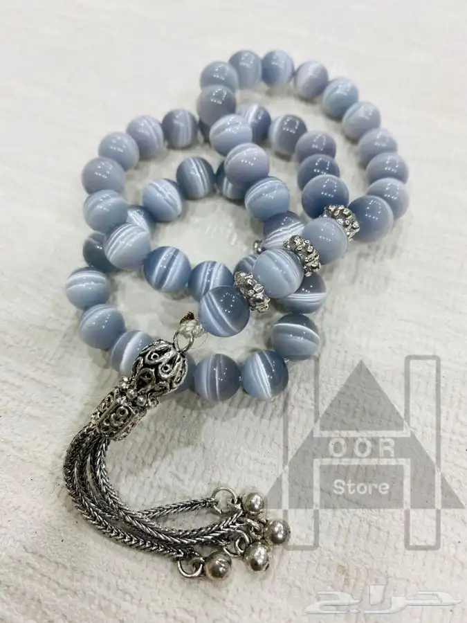 سبحة او مسبحه حجر عين القط بشراب وشواهد فضية 0