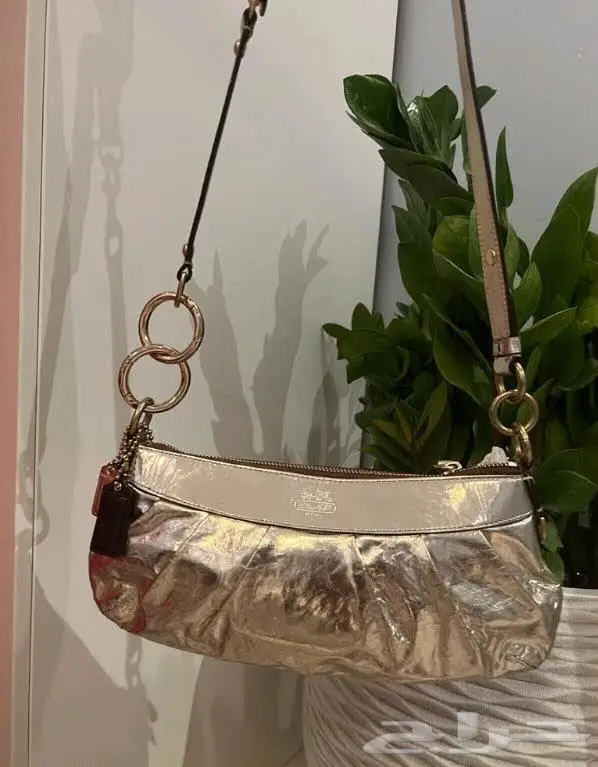 شنطة كوتش اصلية 0