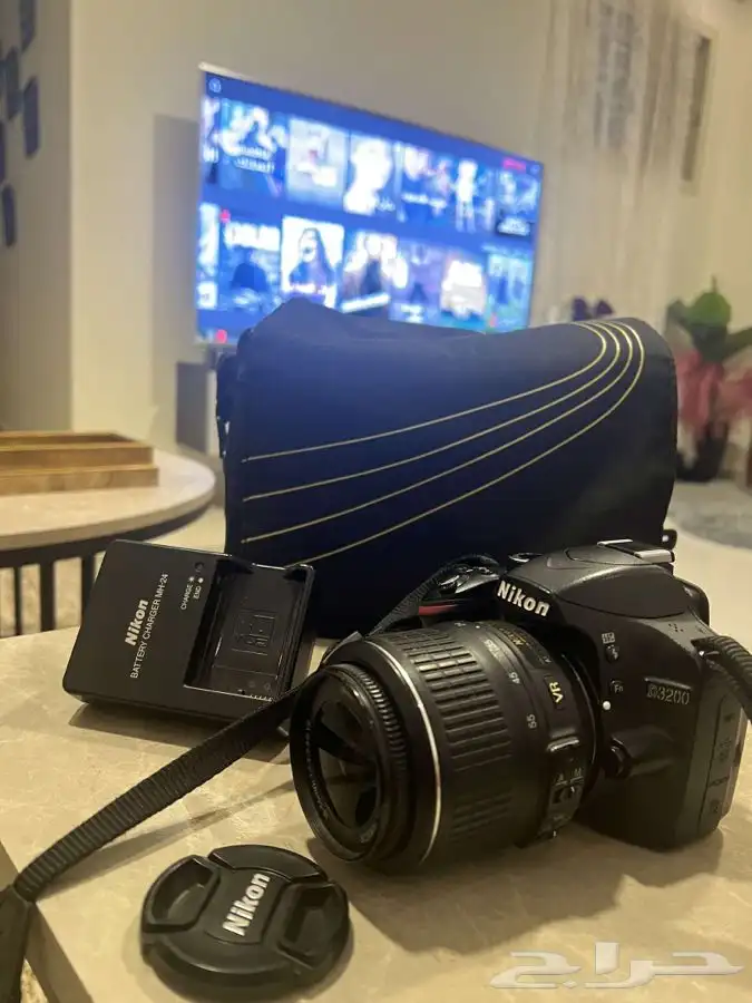 كاميرا نيكون D3200 بكامل أغراضها شبه جديدة 0