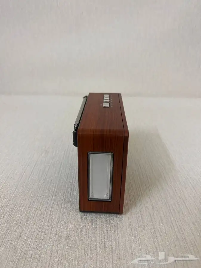 راديو من شركه DLC مع ساعه توقيت 2