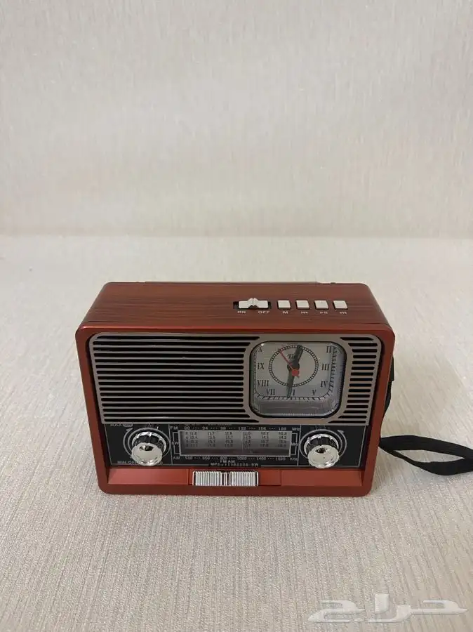 راديو من شركه DLC مع ساعه توقيت 1