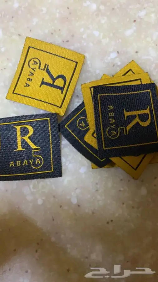 لوقو عبايات لوقو عباية عبايات ليبل قماش تاق بوكسات تغليف 44