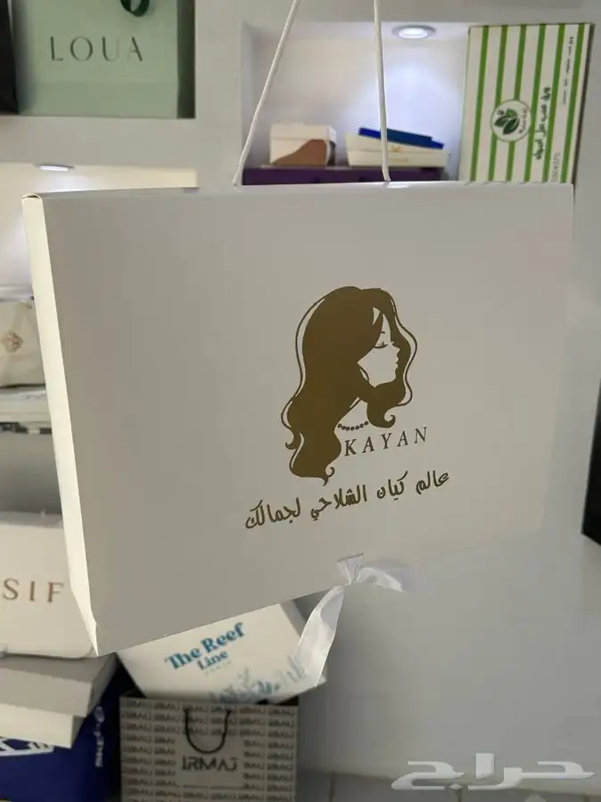 بكسات عبايات_لوقو جلد_ورق تغليف_كرت شكر_ستكر 100 من كل صنف 7