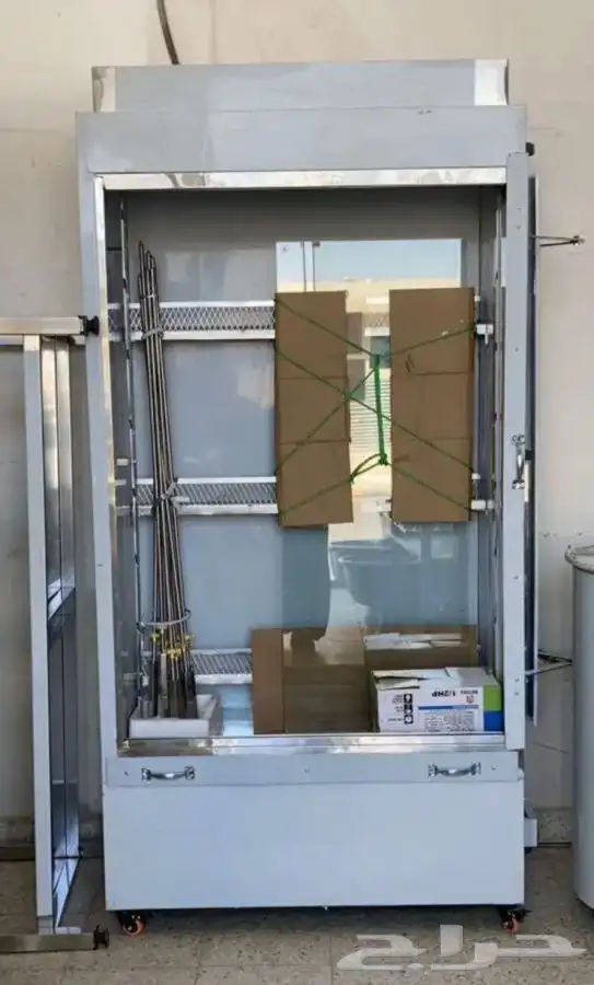 يوجد لدينه  مكينة شورما فحم ستانلس ستيل وشوية دجاج 8