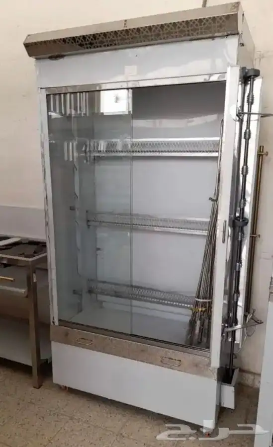 يوجد لدينه  مكينة شورما فحم ستانلس ستيل وشوية دجاج 6