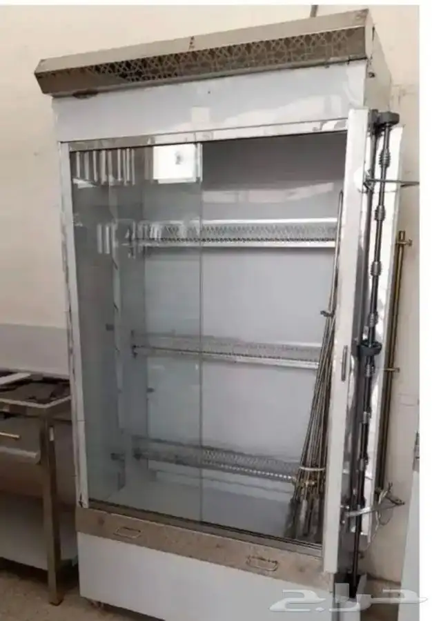 يوجد لدينه  مكينة شورما فحم ستانلس ستيل وشوية دجاج 4