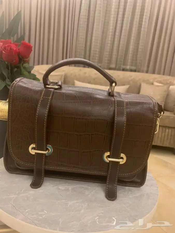 شنطة جلد بني 0