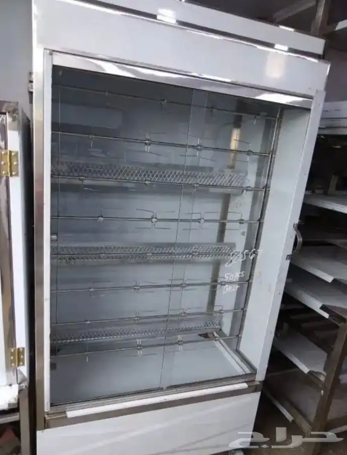 يوجد لدينه  مكينة شورما فحم ستانلس ستيل وشوية دجاج 3