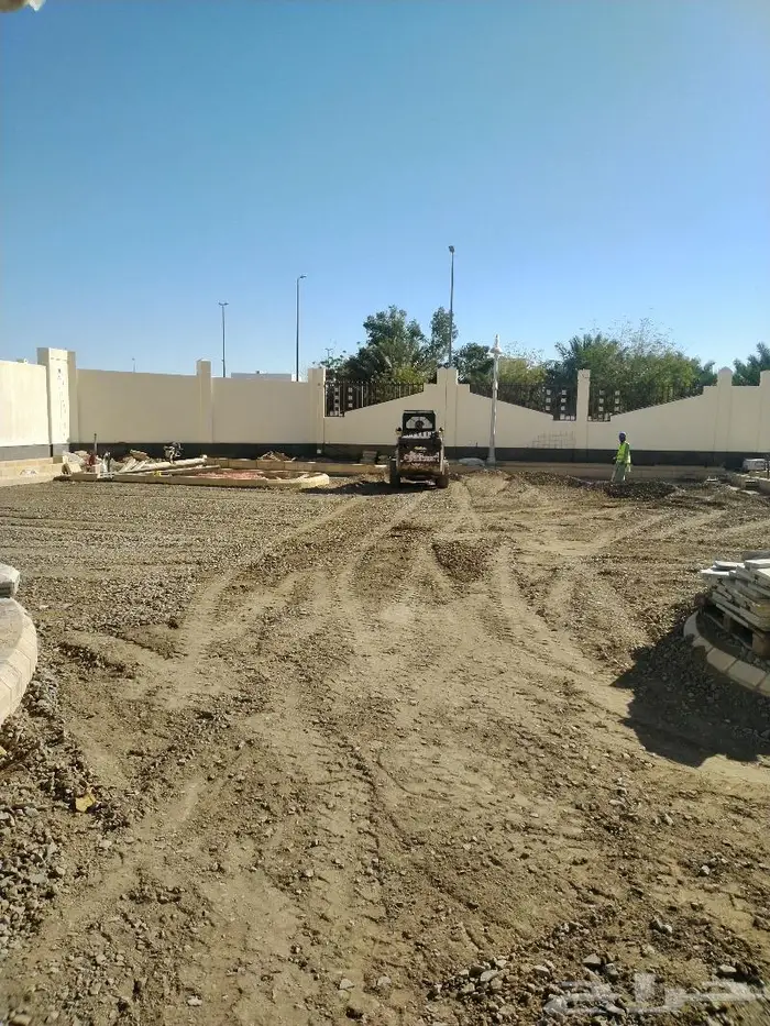 تنفيذ أعمال الحفر والردم والاسفلت واعمال المساحية 7