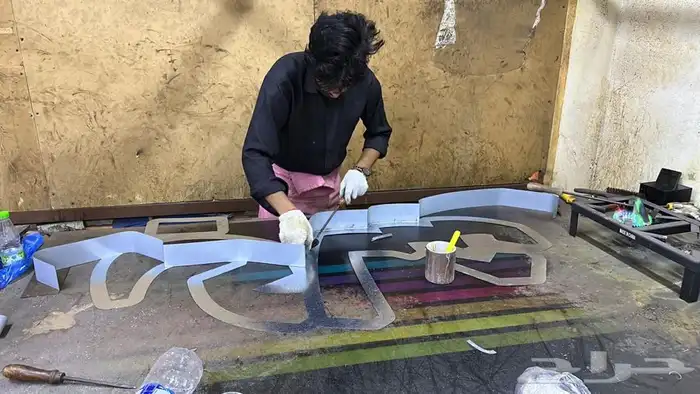 خطاط لوحات تركيب حروف بارزه وكلادنج وصيانه لوحات 14
