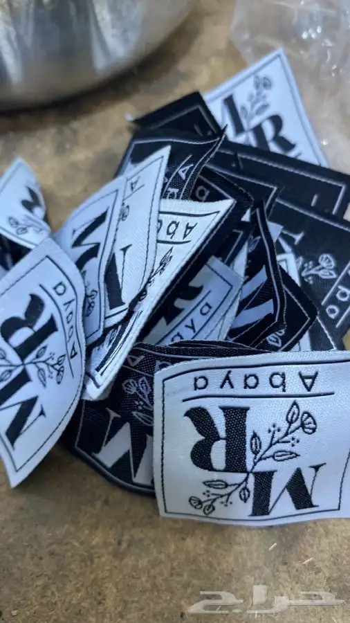 بوكسات أكياس عبايات لوقو جلد ليبل قماش شرايط ريبون تاق كروت 3