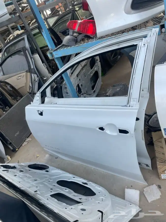 باب امامي يسار افالون موديل 20_21_22_23 ابيض وكاله شد بلد 0