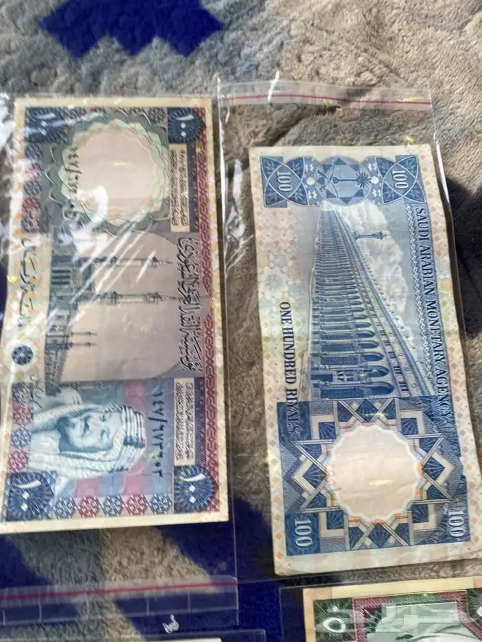 عملة الملك خالد عدد 2 مائة و 4 خمسين 3