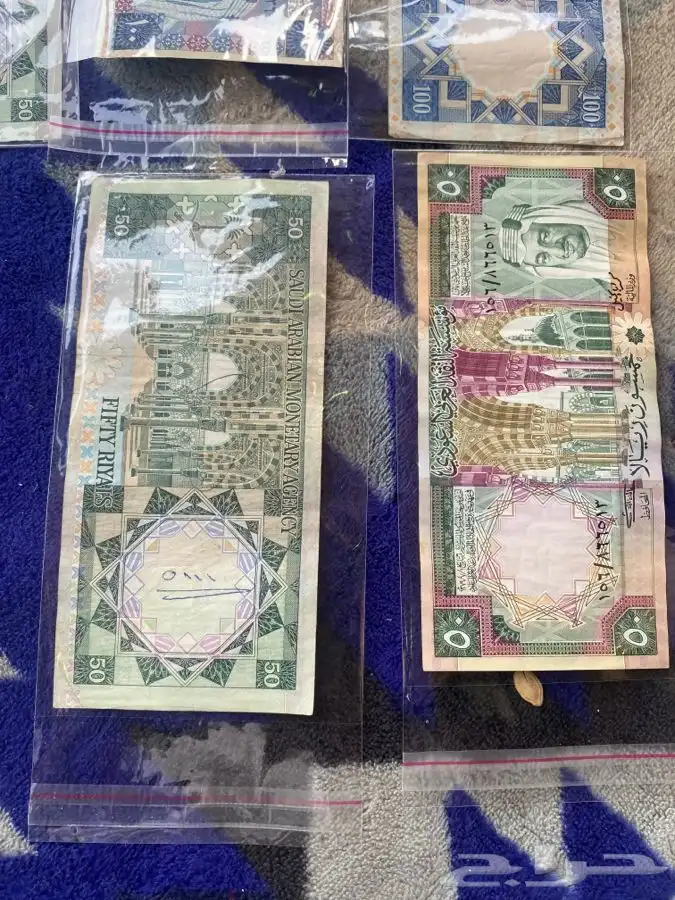 عملة الملك خالد عدد 2 مائة و 4 خمسين 4