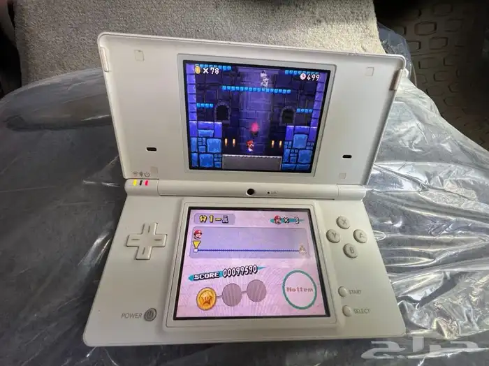 جهاز العاب نيتندو ( دي اس) مع شريط سوبر ماريو 1