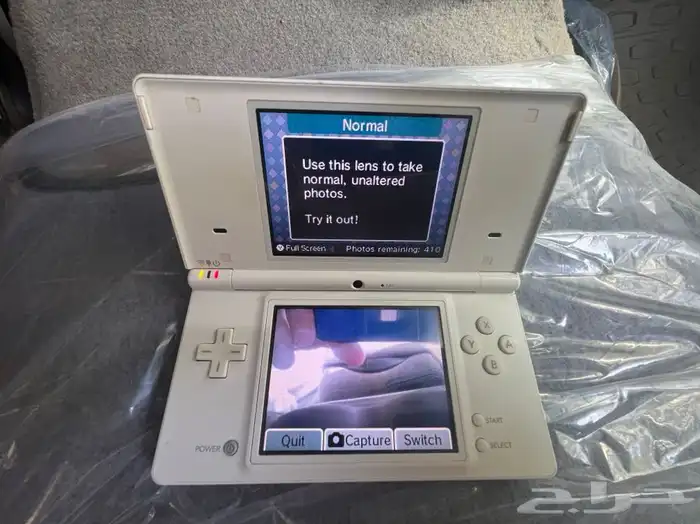 جهاز العاب نيتندو ( دي اس) مع شريط سوبر ماريو 2