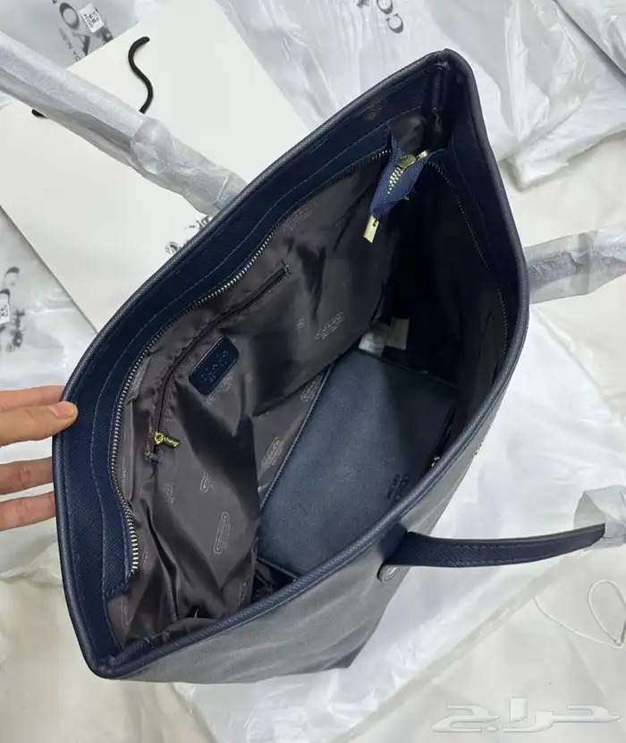 شنطة ماركة كوتش 4