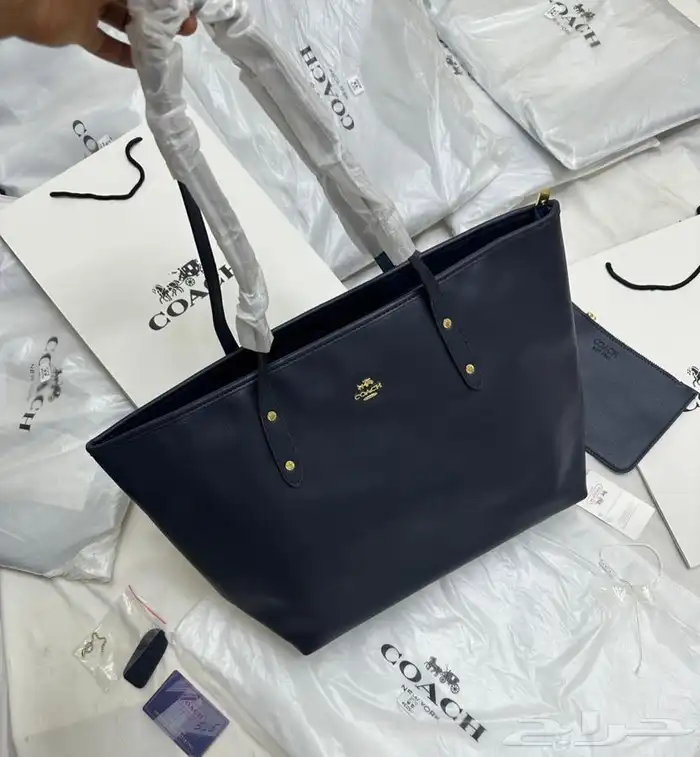 شنطة ماركة كوتش 5