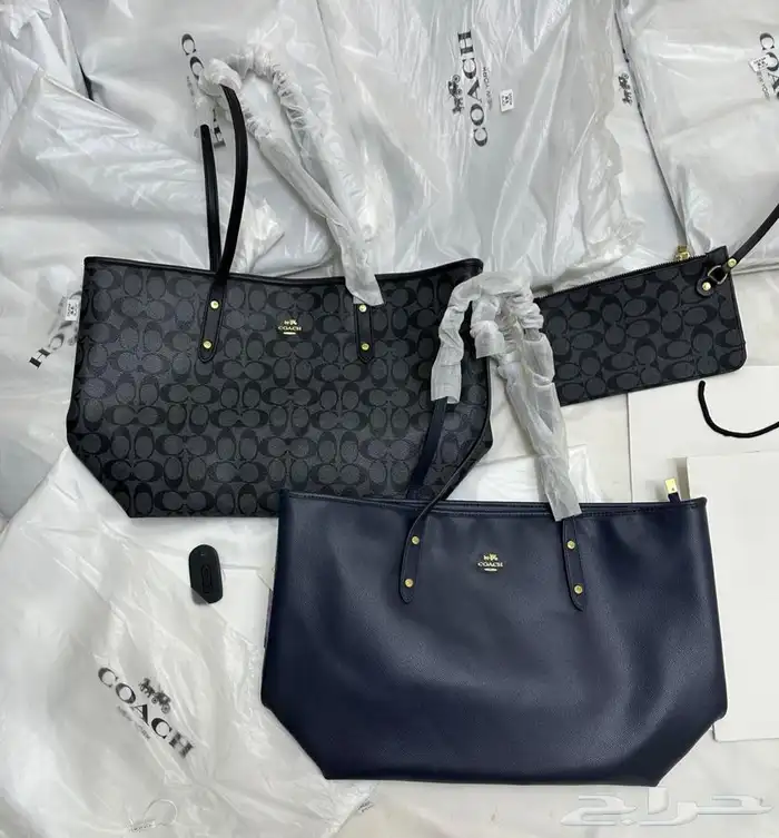 شنطة ماركة كوتش 0