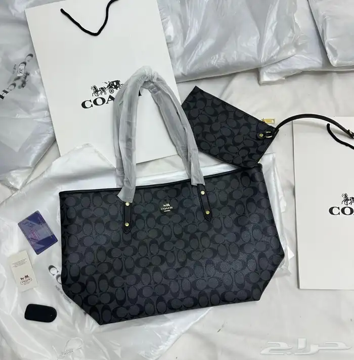 شنطة ماركة كوتش 3