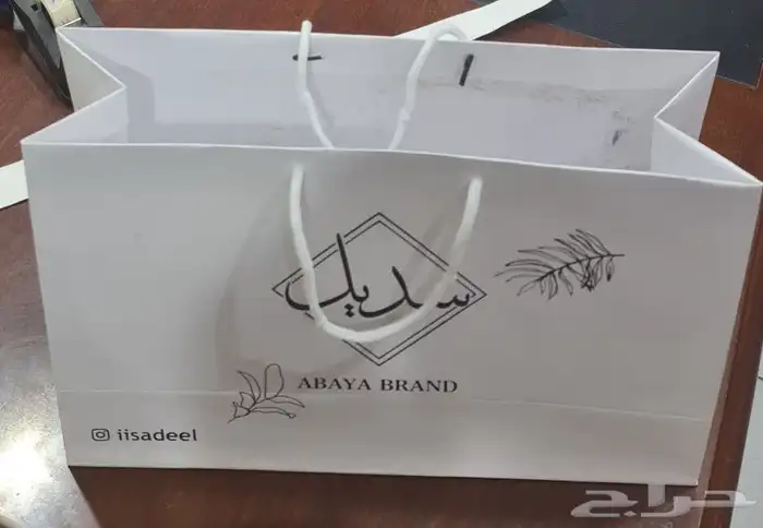 ليبل جلد لوقو قماش اكياس عبايات 9