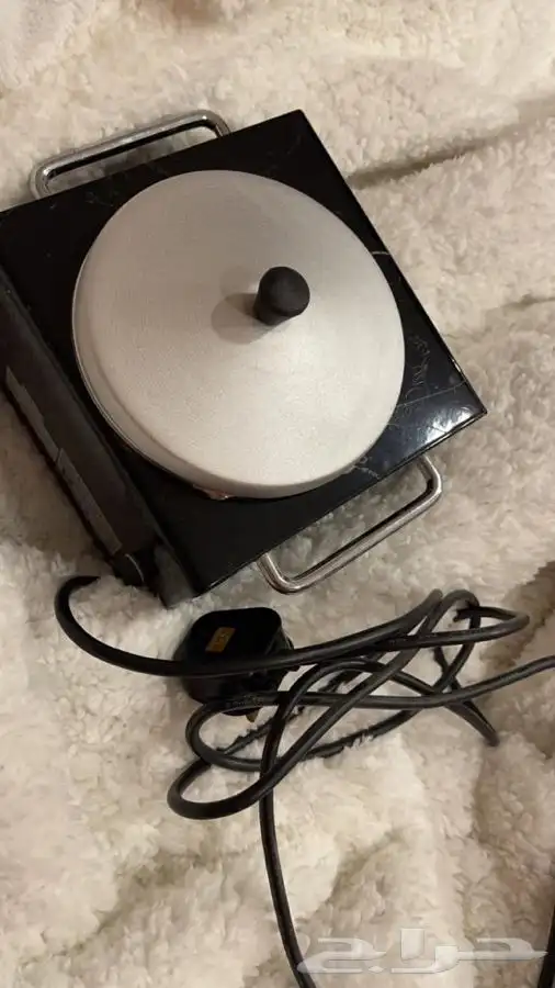 الة الشمع لإزالة الشعر 0