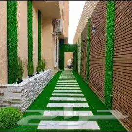تنسيق الحدائق والفلل والقصور عشب صناعي وطبيعي وجداري 3