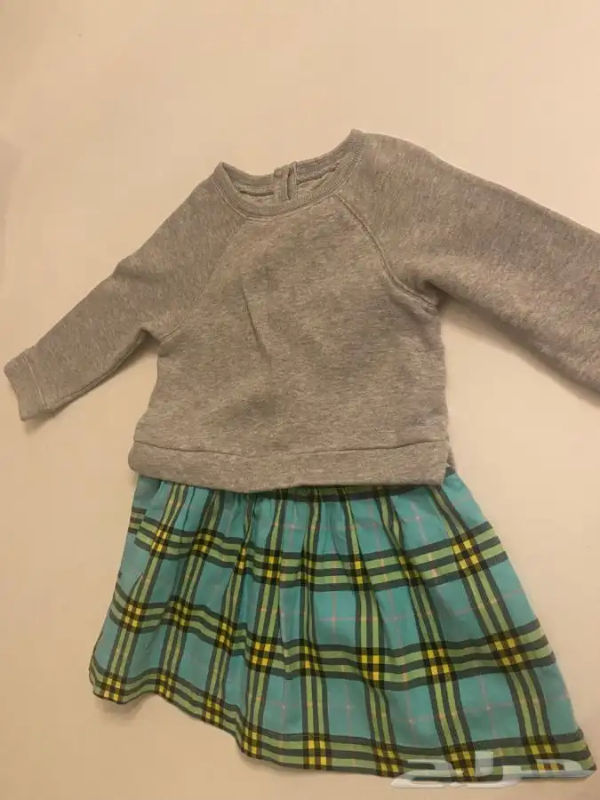 جزم وفساتين براند Dior UGGs dutch and Gabbana Burberry 0