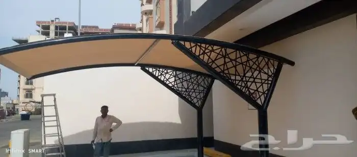 مظلات سيارات ومظلات مدارس وسواتر 1