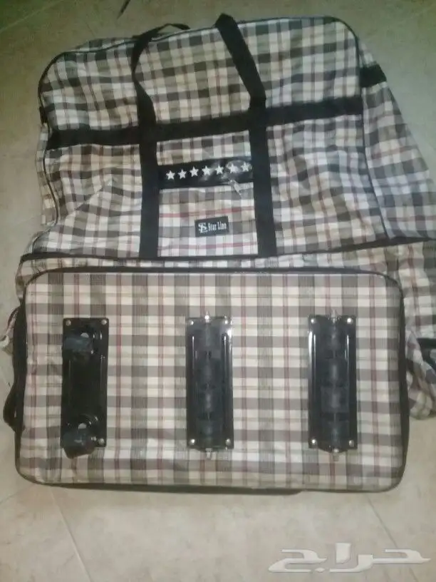 شنطة او كيس سفر قوي بعجلات يحمل 30 كيلو وفوق 4